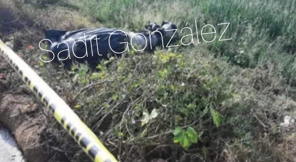 Hallan cadáver a un costado en la México-Puebla