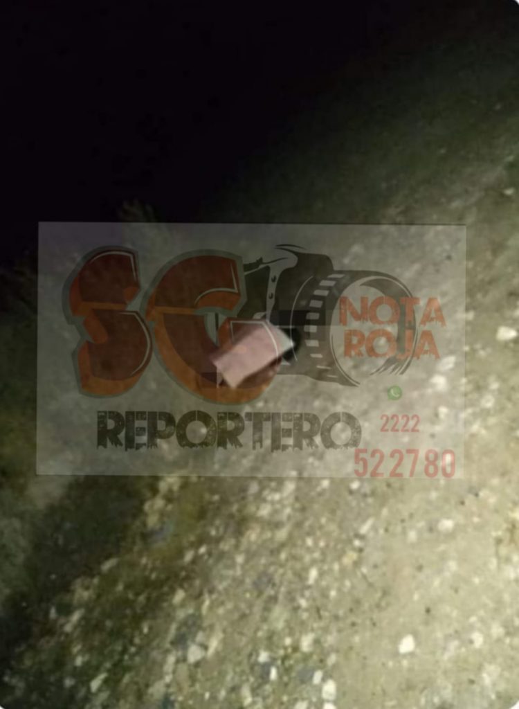 Tiran embolsado, con huellas de violencia y narcomensaje en Tlacotepec